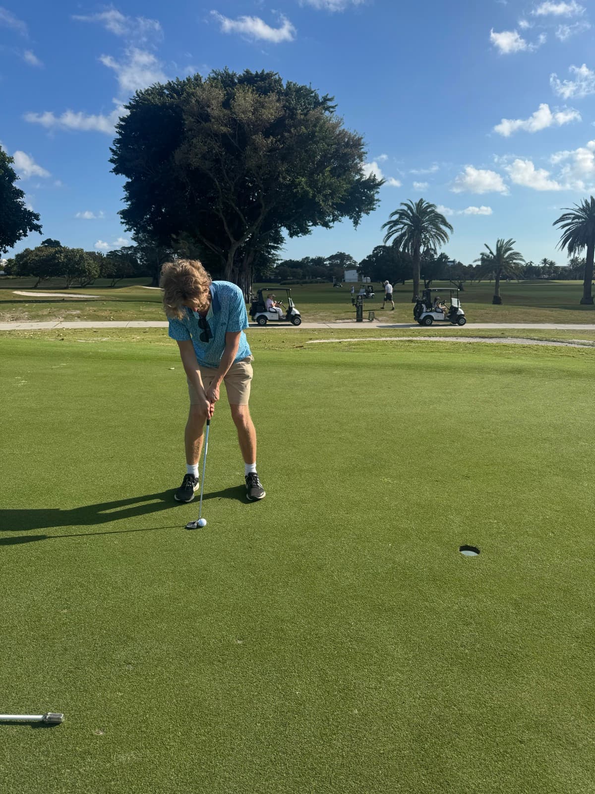 Playing a round on a golf course in Miami